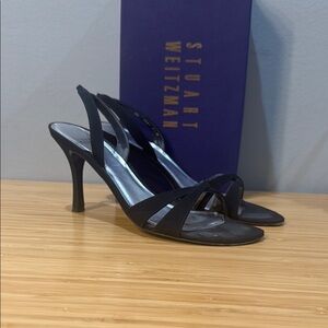 Stuart Weitzman Black Heels with Strappy Design and Tall Stiletto